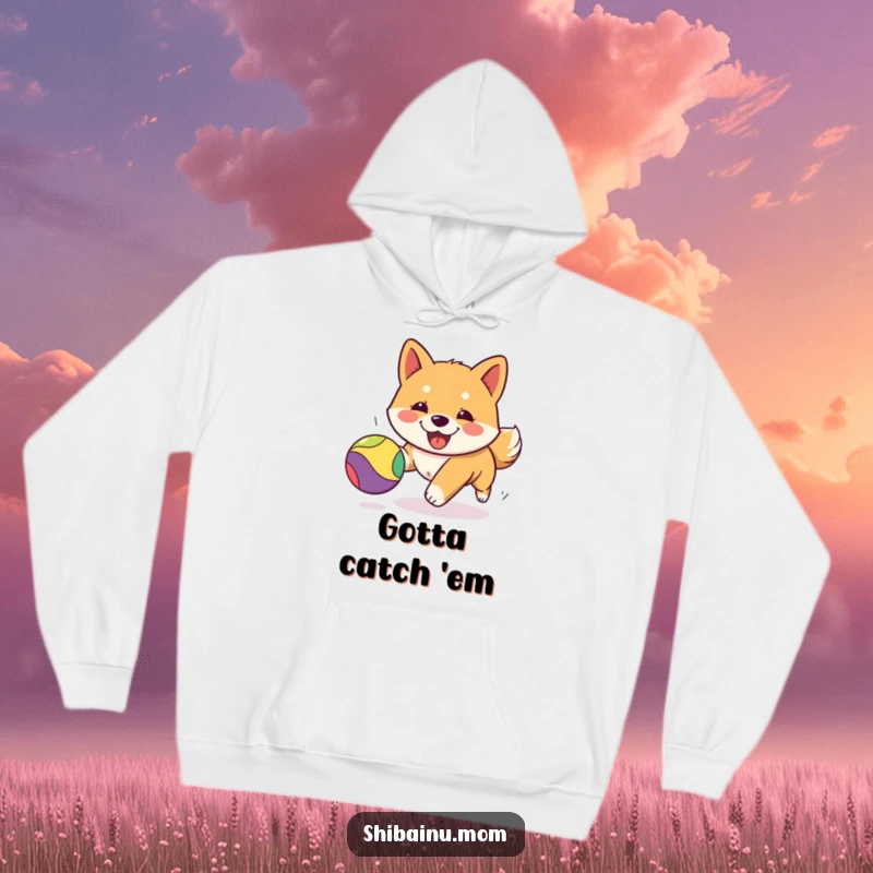 Funny Kawaii Shiba Inu hoodie depicting an energetic puppy gleefully pursuing a brightly colored bouncing ball, perfect for cozying up.