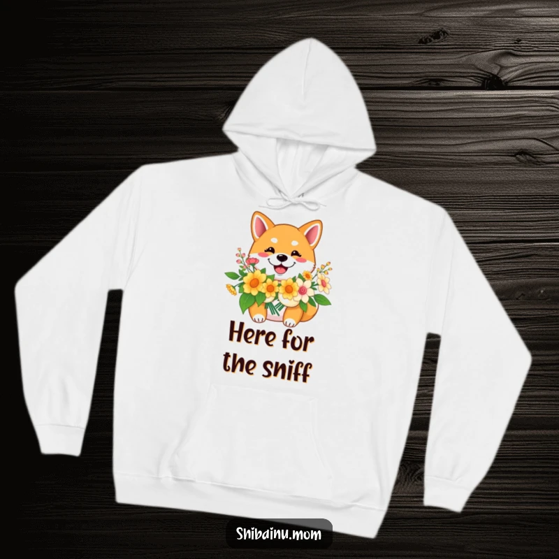 Funny Shiba Inu hoodie, a smiling dog holds a flower bouquet, offering cheerful warmth and cozy vibes.