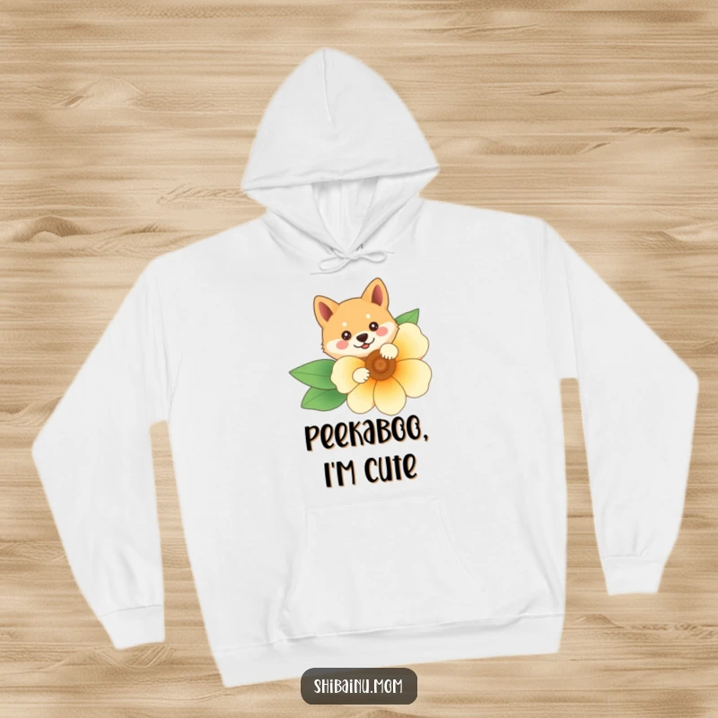 Funny Shiba Inu hoodie showing the character peeking from behind a vibrant flower, offering comfort and a hidden dose of humor.