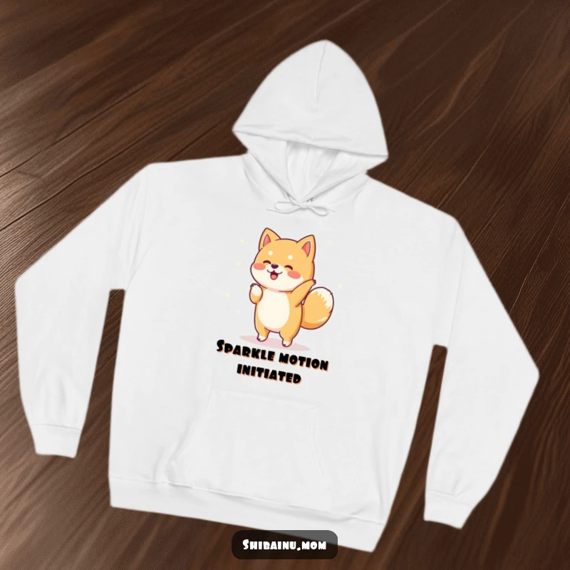 Funny Shiba Inu hoodie showcasing a dog dancing joyfully amidst a shower of magical sparkles, perfect for cozy enchantment.