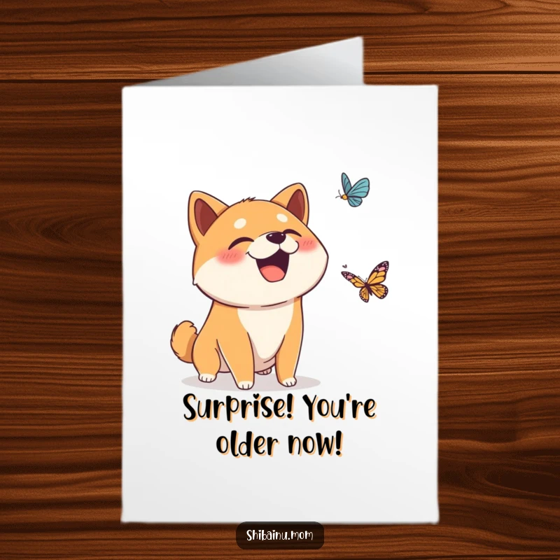 Funny Free Printable Birthday Card: Shiba Inu giggling at a falling butterfly, mouth open, perfect gift.