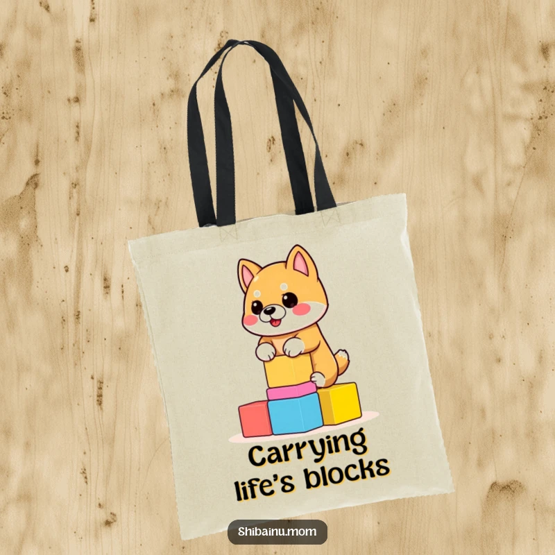 Funny Shiba Inu Tote Bag showing a dog balancing a tower of colorful, wobbly blocks. Practical and funny, a funny gift.
