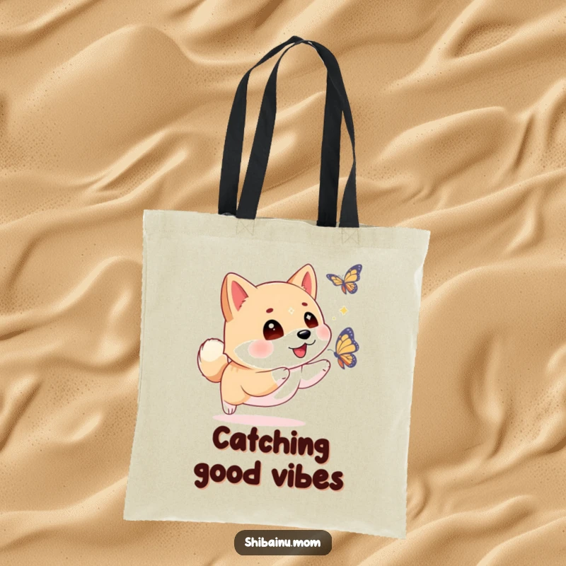 Funny Shiba Inu tote bag with sparkling eyes, captured mid-chase after a butterfly, ideal for stylish and humorous everyday use.